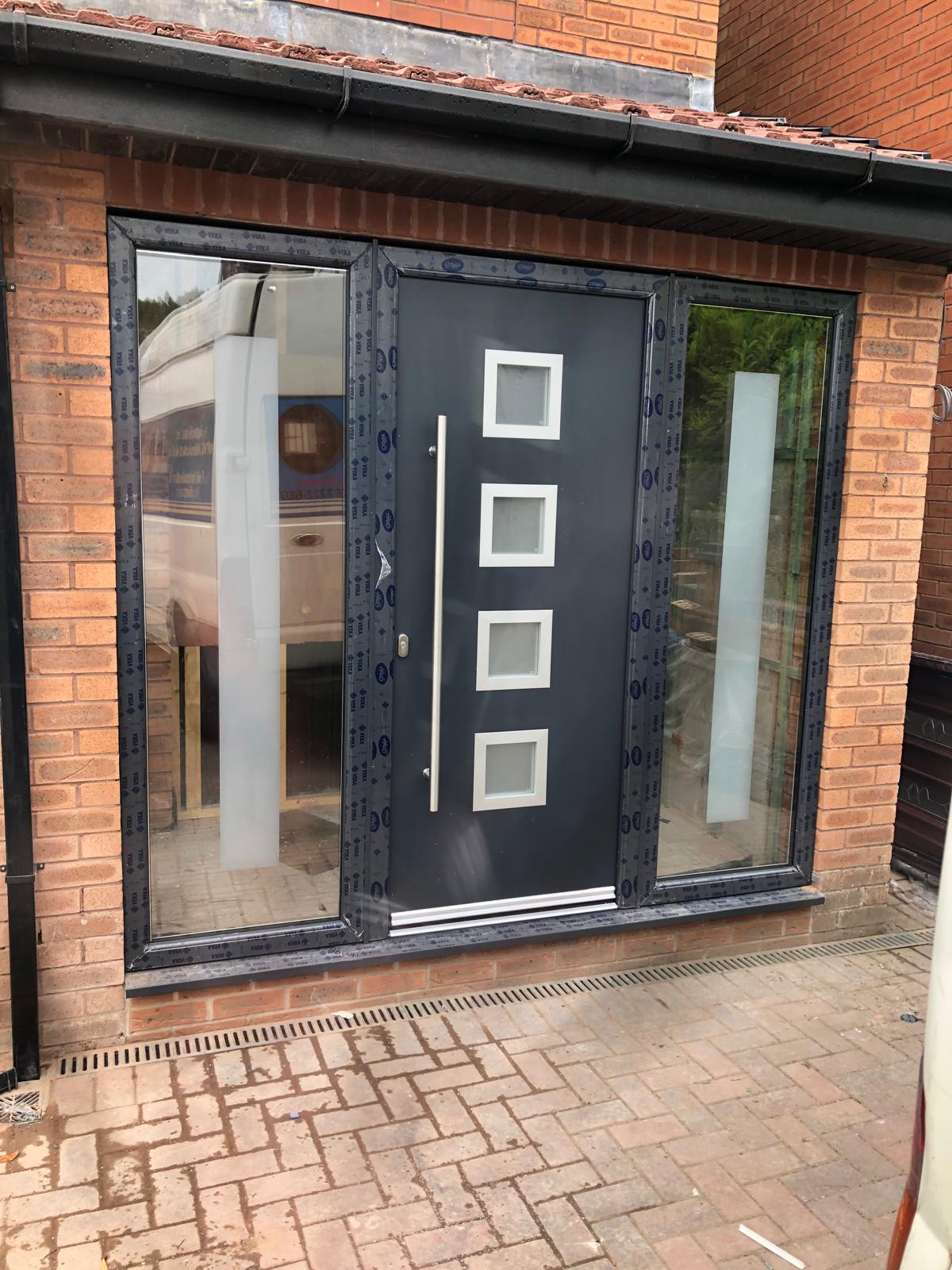 Anthracite grey composite front door with side panels fitted